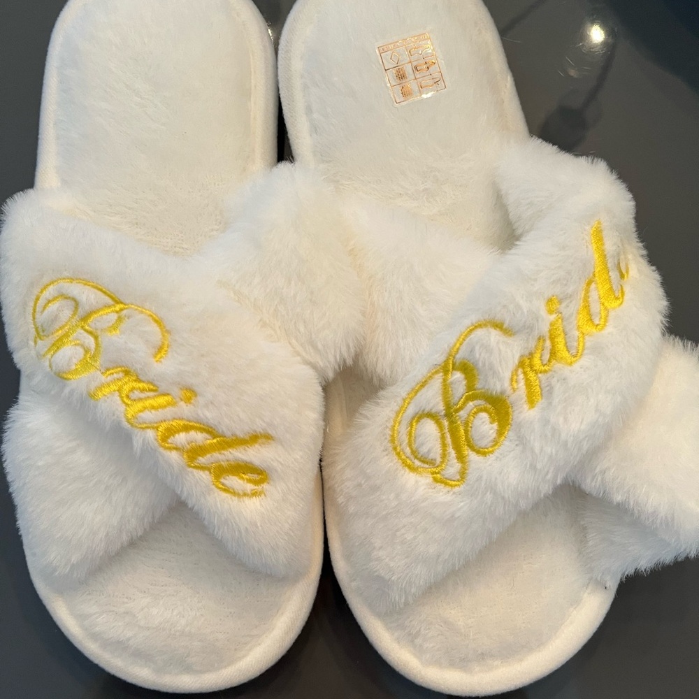 Brand new - Bride fuzzy slippers fits size 6-6.5